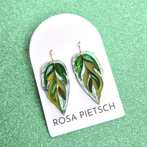 Handmade Calathea leaf earrings by Rosa Pietsch featuring green marbled acrylic and gold-filled hooks.