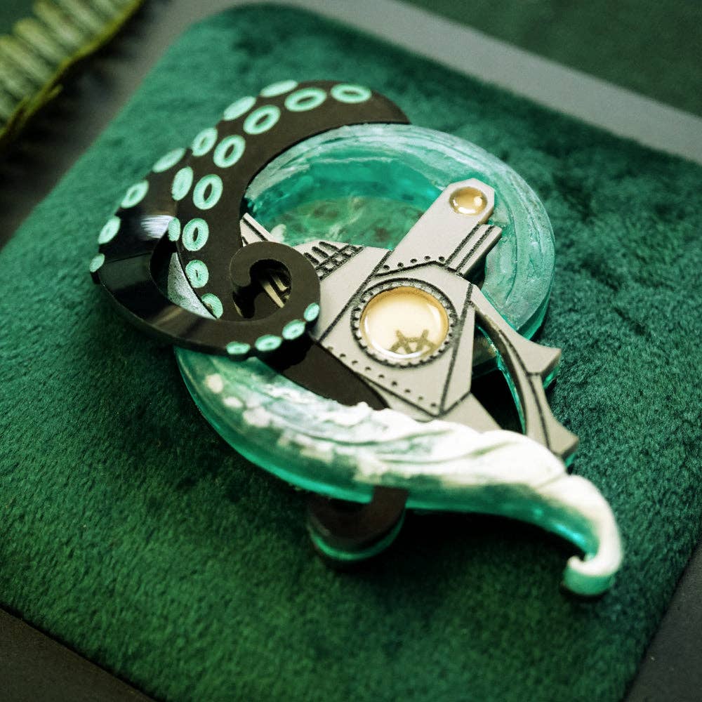 Nautilus Vs. Squid Brooch by Lost Kiwi Designs