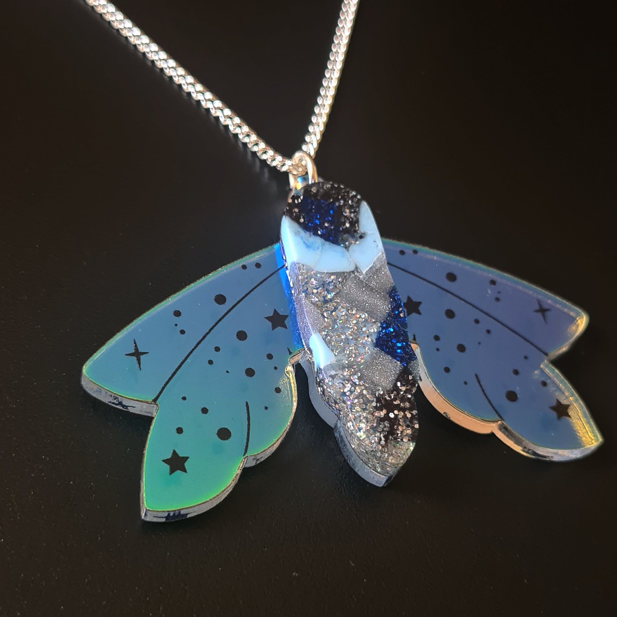 Recycled Acrylic Celestial Moth Necklace by Esoteric London (Blue/Black)