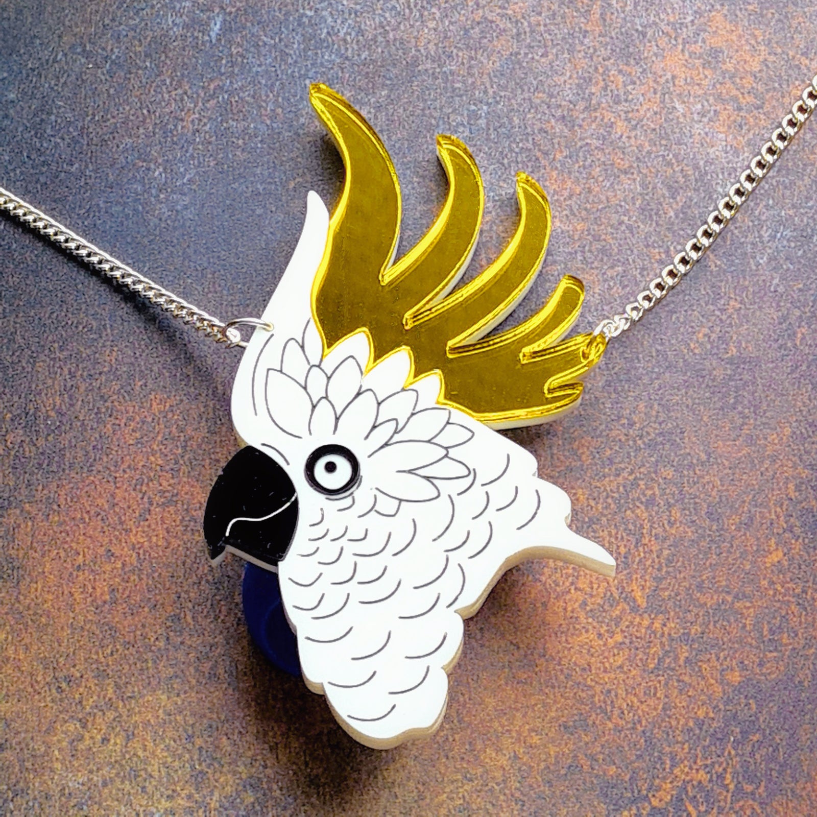Cockatoo Necklace by Designosaur